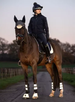 LeMieux Reflective Grafter Boot -Exquisite Equestrian Equipment Store it03586 lifestyle grafterbrushingboot reflective 1 2 4 jpg